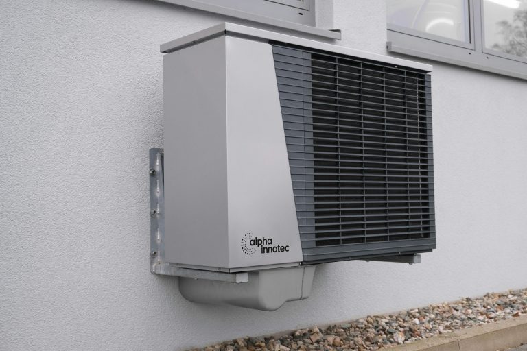 air conditioner unit protruding from an exterior wall